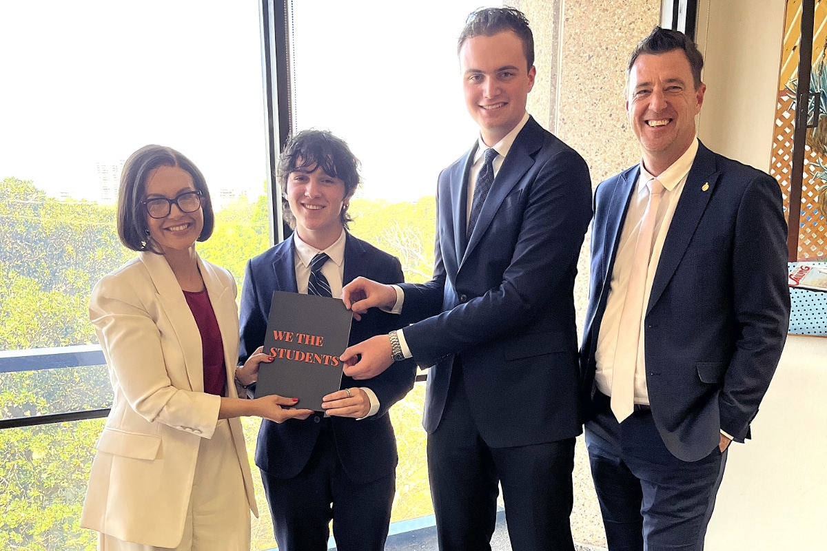 Picture of NSW Minister for Education standing with 2 students from Northern Beaches Christian School